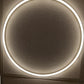 Round Halo LED Linear Frame Light lit in use in a ceiling grid