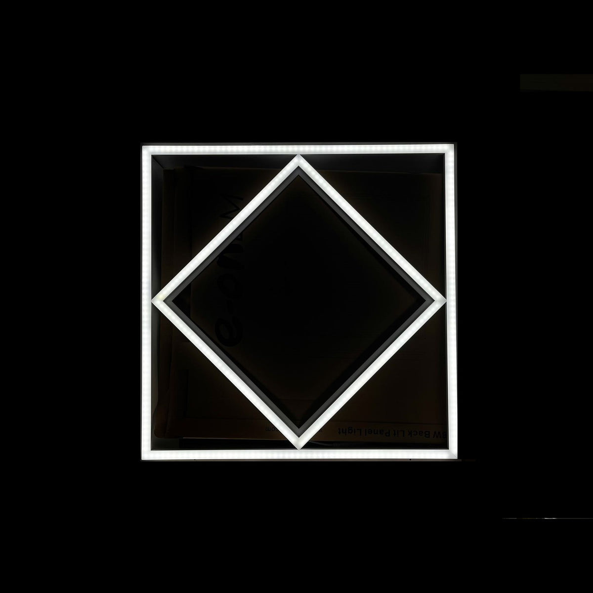 White Diamond Linear Frame Light lit, white diamond on black background