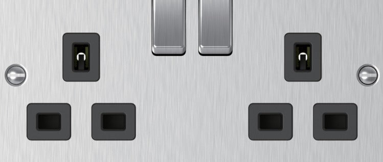 Close-up of brushed steel 2 gang socket outlets and switches