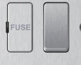 Close-up of brushed steel switched FCU fuse holder and rocker