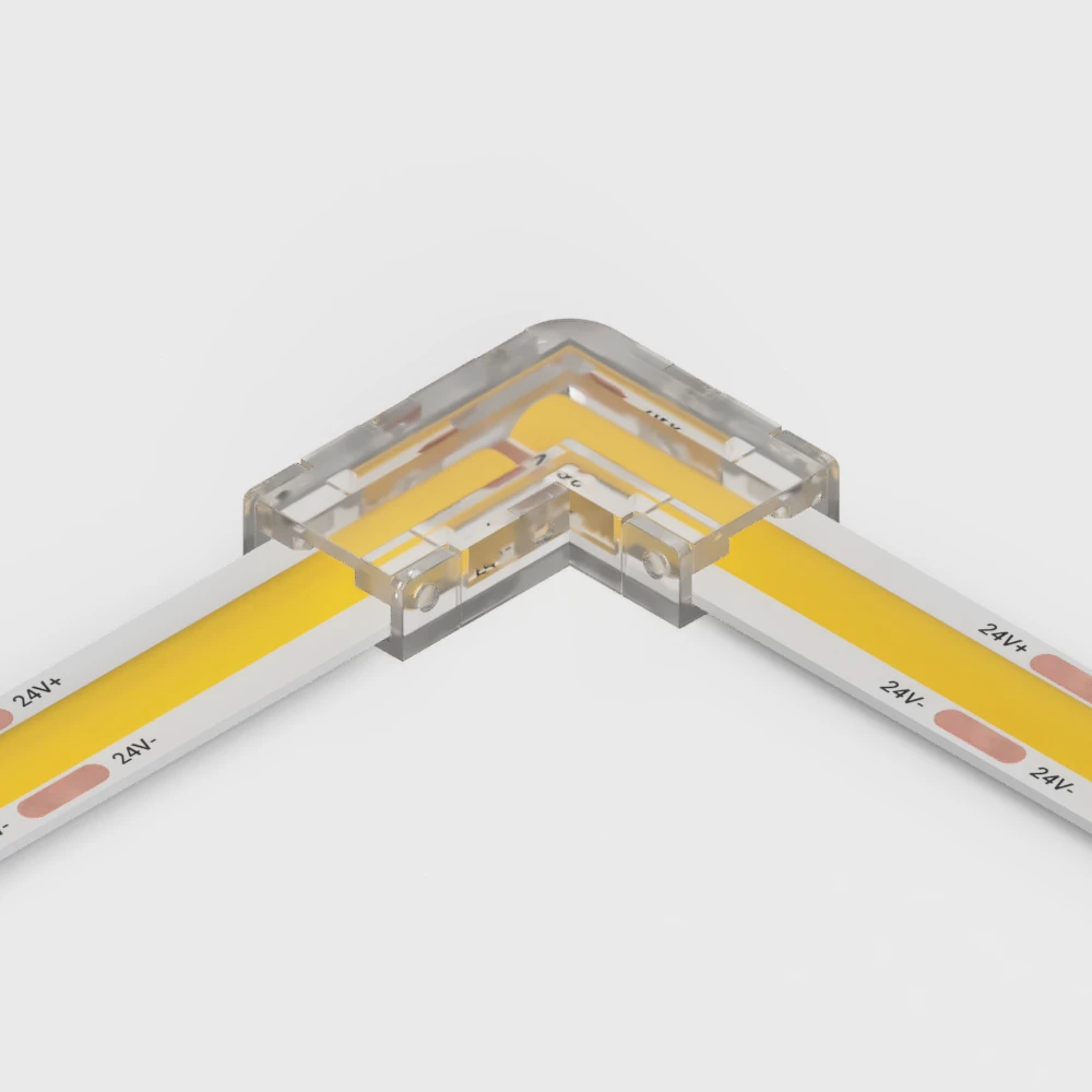 L-shaped COB strip connector fitted on a COB LED strip at a 90 degree corner, 24V markings visible