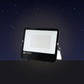 LED Dual Voltage Floodlight on a driveway at night – lifestyle image, product unchanged