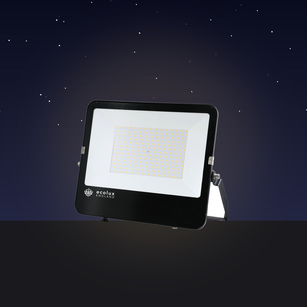 LED Dual Voltage Floodlight on a driveway at night – lifestyle image, product unchanged