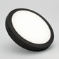 Black round LED panel light glowing in 4000K cool white