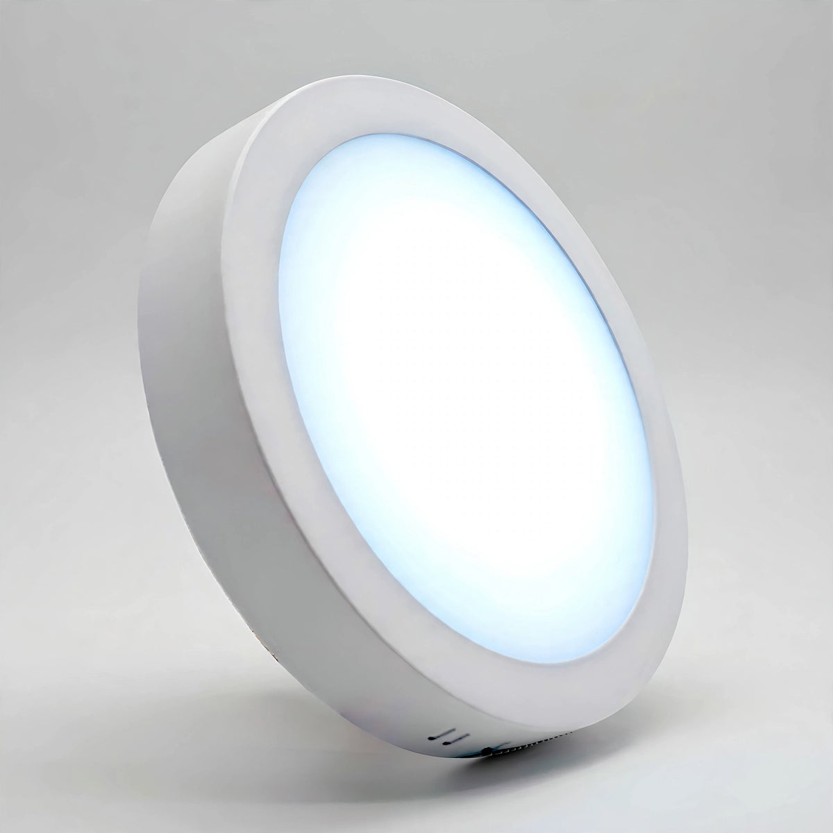 Round LED panel light glowing in 6500K daylight