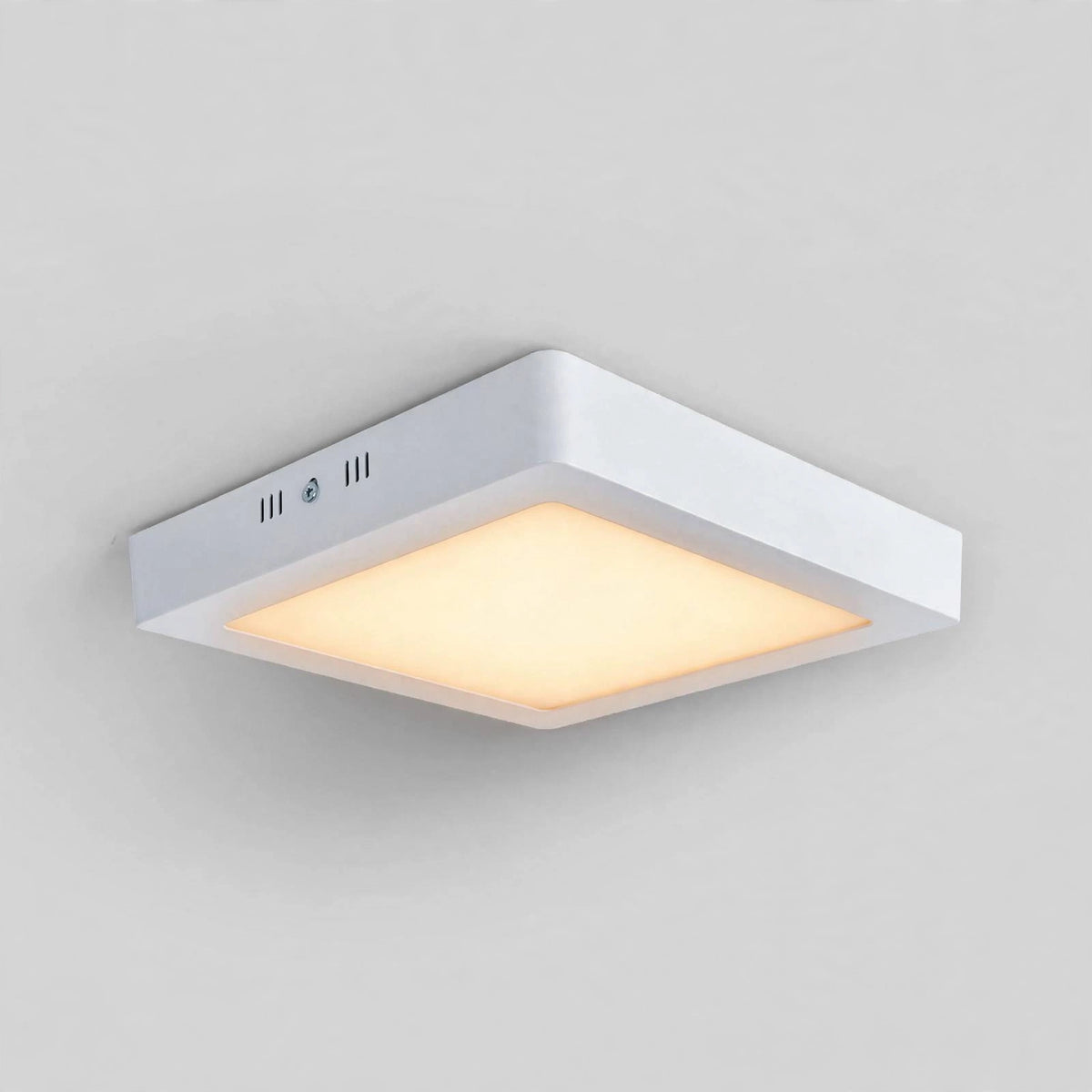 Square LED panel light glowing in 3000K warm white