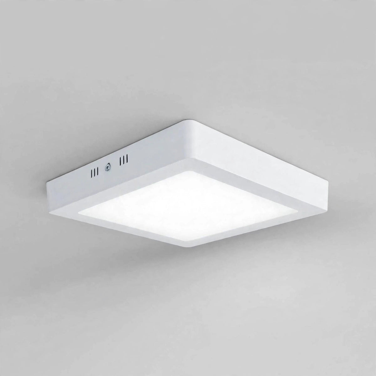 Square LED panel light glowing in 4000K cool white