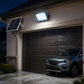 Solar LED floodlight lighting a driveway at night